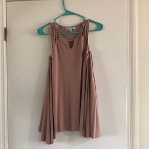 She + Sky sleeveless shirt in mauve.